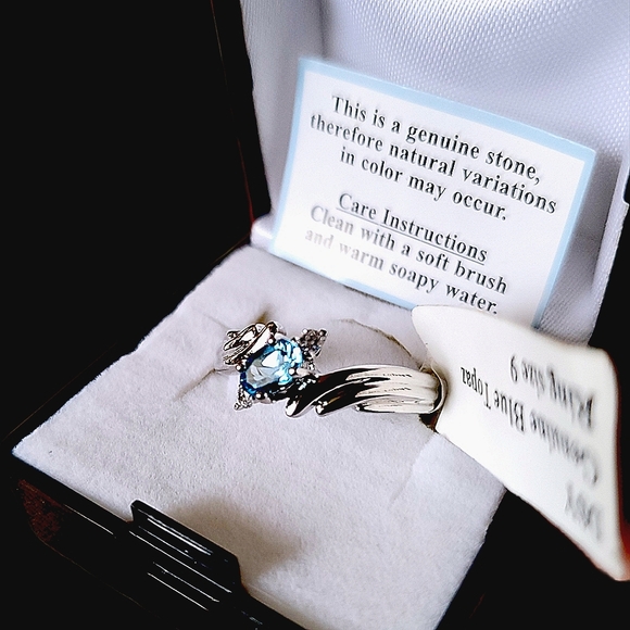 Jewelry Jewelry - Genuine Blue Topaz Ring on Sterling Silver Band